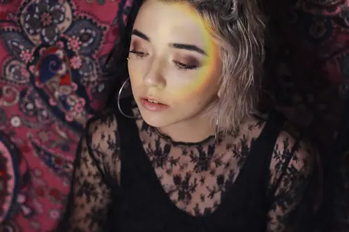 MYSTICA — rainbow light across a smoky eye