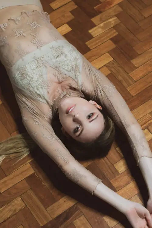 MYSTICA — nude lace, overhead shot on wood