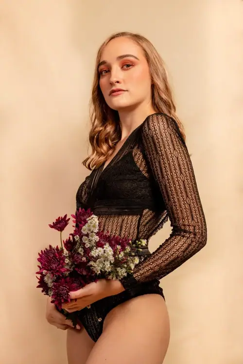 MYSTICA — lace bodysuit with flowers in studio